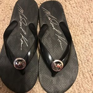 Michael Kors flip flops.SOLD